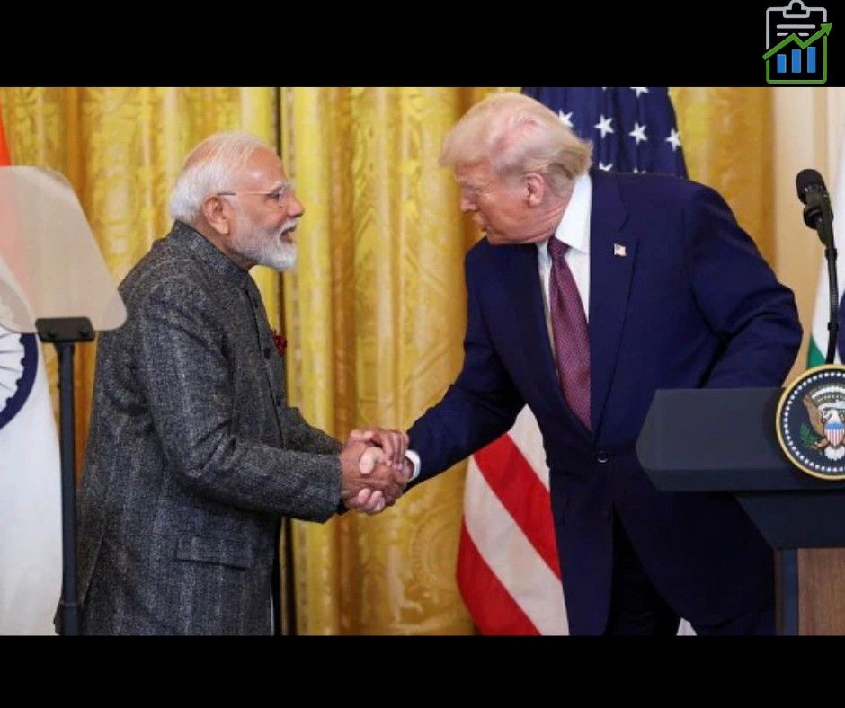 "Indian Prime Minister Narendra Modi shakes hands with former U.S. President Donald Trump at a press event with Indian and American flags in the background."