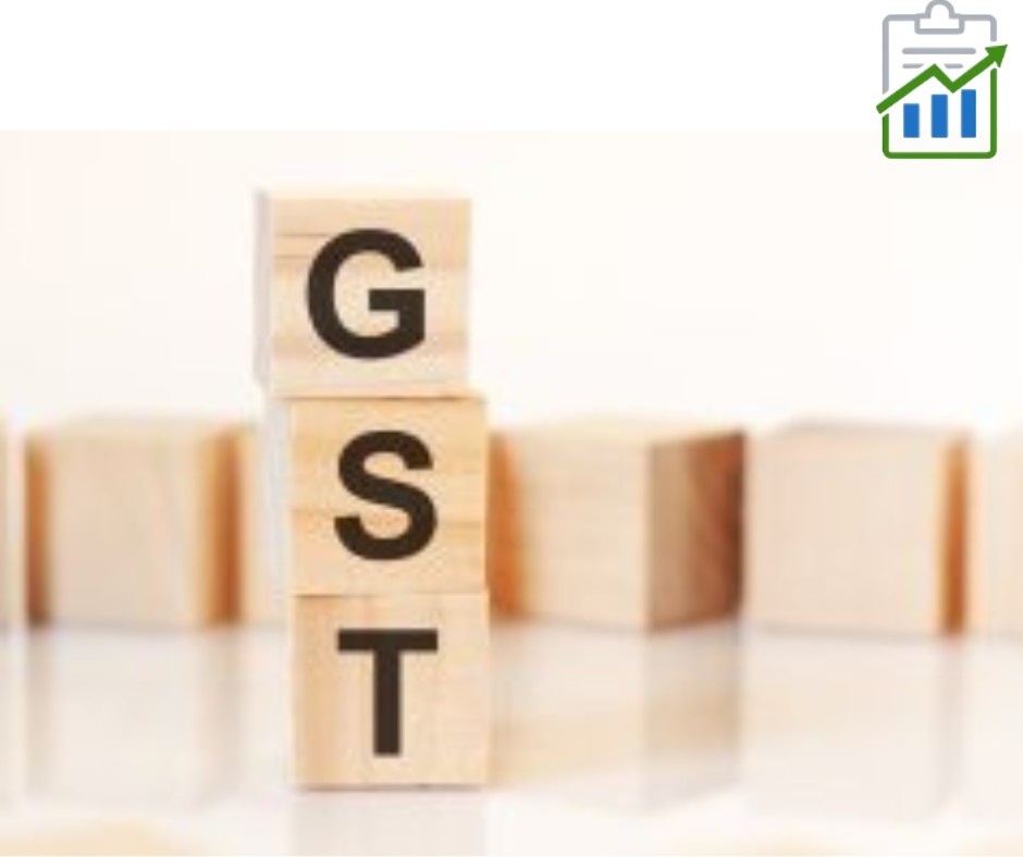 “Stacked wooden blocks with the letters GST, symbolizing GST compliance and structure, with a blurred background, representing cross-state ITC transfers in mergers.”

